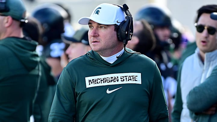 Nov 2, 2024; East Lansing, Michigan, USA;  Michigan State Spartans head coach Jonathan Smith looks over his sidelines during the first quarter against the Indiana Hoosiers at Spartan Stadium. Mandatory Credit: Dale Young-Imagn Images