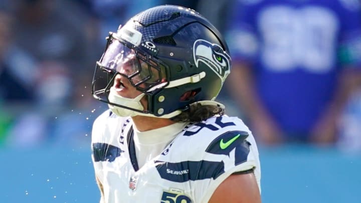 Seattle Seahawks linebacker Drake Thomas (42) celebrates a tackle on Tennessee Titans running back Tony Pollard (20) during the second quarter at Nissan Stadium in Nashville, Tenn., Sunday, Nov. 23, 2025. Seattle Seahawks linebacker Drake Thomas (42) celebrates a tackle on Tennessee Titans running back Tony Pollard (20) during the second quarter at Nissan Stadium in Nashville, Tenn., Sunday, Nov. 23, 2025.