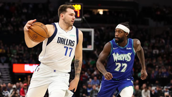 Mar 25, 2022; Minneapolis, Minnesota, USA; Dallas Mavericks guard Luka Doncic (77) dribbles the ball past Minnesota Timberwolves guard Patrick Beverley (22) in the first quarter at Target Center. Mandatory Credit: David Berding-Imagn Images Mar 25, 2022; Minneapolis, Minnesota, USA; Dallas Mavericks guard Luka Doncic (77) dribbles the ball past Minnesota Timberwolves guard Patrick Beverley (22) in the first quarter at Target Center. Mandatory Credit: David Berding-Imagn Images