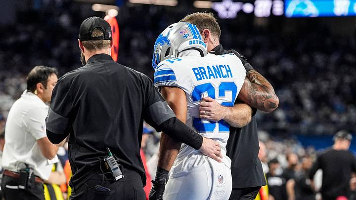 Detroit Lions safety Brian Branch (32) with help of Lions staff, walk off the field due to an injury against Dallas Cowboys Detroit Lions safety Brian Branch (32) with help of Lions staff, walk off the field due to an injury against Dallas Cowboys