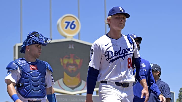 Los Angeles Dodgers starting pitcher Emmet Sheehan (80) and catcher Dalton Rushing (68) walk to the dugout after warming up for the game against the Houston Astros at Dodger Stadium on July 6