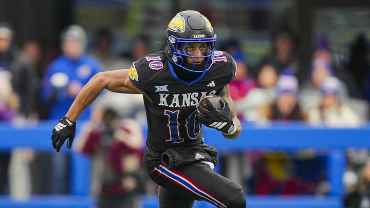 Nov 28, 2025; Lawrence, Kansas, USA; Kansas Jayhawks wide receiver Levi Wentz (10) runs with the ball during the second half against the Utah Utes at David Booth Kansas Memorial Stadium. Mandatory Credit: Jay Biggerstaff-Imagn Images Nov 28, 2025; Lawrence, Kansas, USA; Kansas Jayhawks wide receiver Levi Wentz (10) runs with the ball during the second half against the Utah Utes at David Booth Kansas Memorial Stadium. Mandatory Credit: Jay Biggerstaff-Imagn Images