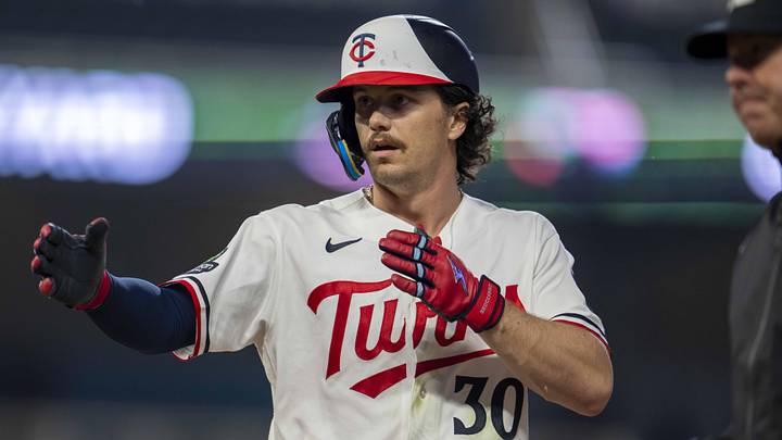 Minnesota Twins center fielder James Outman (30) celebrates 