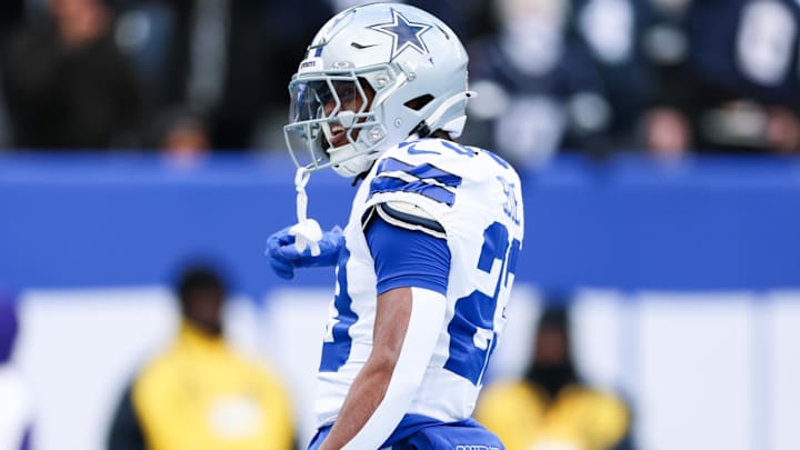 Dallas Cowboys RB Jaydon Blue celebrates after scoring a touchdown during the first quarter against the New York Giants.