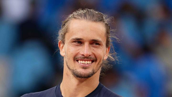 Alexander Zverev poses with the trophy after winning the French Open Alexander Zverev poses with the trophy after winning the French Open