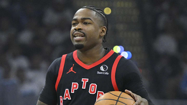 Apr 29, 2026; Cleveland, Ohio, USA; Toronto Raptors guard Jamal Shead (23) brings the ball up court against the Cleveland Cavaliers in the first quarter of game five of the first round of the 2026 NBA Playoffs at Rocket Arena. Mandatory Credit: David Richard-Imagn Images