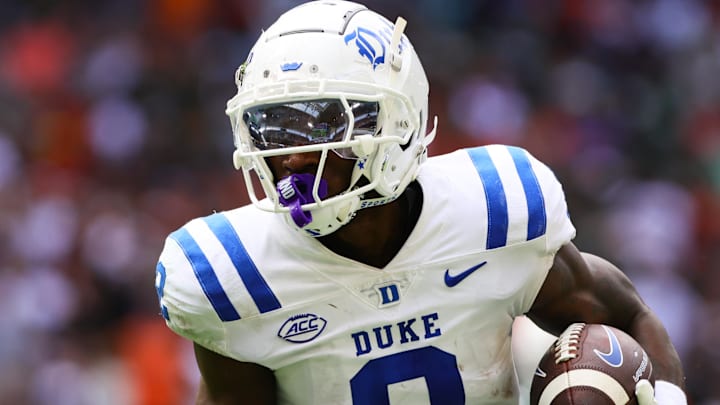 Nov 2, 2024; Miami Gardens, Florida, USA; Duke Blue Devils wide receiver Sahmir Hagans (2) runs with the football for a touchdown against the Miami Hurricanes during the second quarter at Hard Rock Stadium. Mandatory Credit: Sam Navarro-Imagn Images