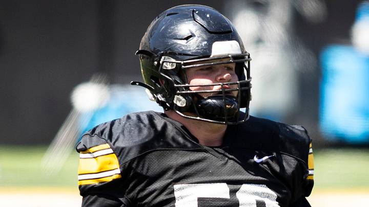 Iowa offensive lineman Kade Pieper looks to the sideline during a spring NCAA football open practice at Kinnick Stadium. Iowa offensive lineman Kade Pieper looks to the sideline during a spring NCAA football open practice at Kinnick Stadium.