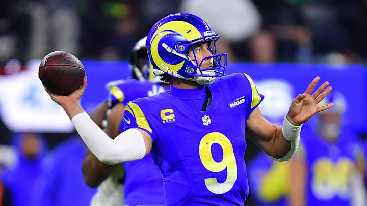 Nov 24, 2024; Inglewood, California, USA; Los Angeles Rams quarterback Matthew Stafford (9) throws against the Philadelphia Eagles during the second half at SoFi Stadium. Mandatory Credit: Gary A. Vasquez-Imagn Images