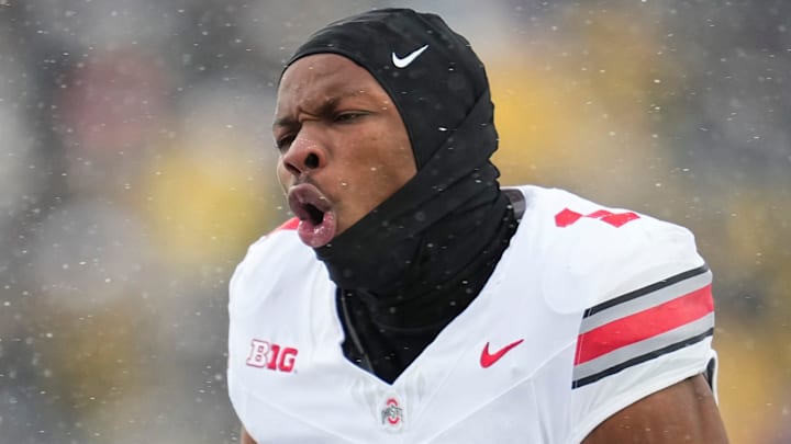 Ohio State Buckeyes cornerback Davison Igbinosun (1) celebrates an interception during the NCAA football game against the Michigan Wolverines at Michigan Stadium in Ann Arbor, Mich. on Nov. 29, 2025. Ohio State won 27-9.