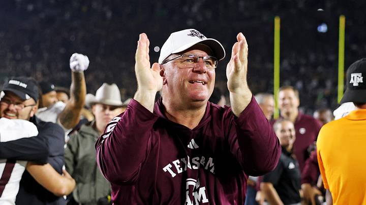Sep 13, 2025; South Bend, Indiana, USA; Texas A&M Aggies head coach Mike Elko celebrates after the game against Notre Dame Fighting Irish at Notre Dame Stadium. Mandatory Credit: Trevor Ruszkowski-Imagn Images