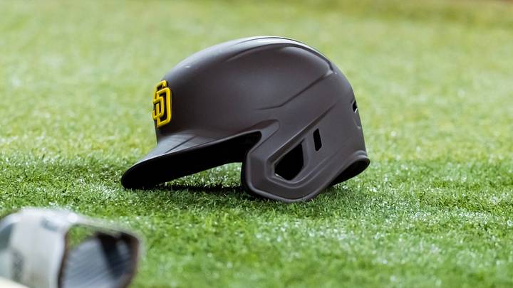 Jun 13, 2025; Phoenix, Arizona, USA; Detailed view of a San Diego Padres batting helmet and baseball bat on the field at Chase Field. Mandatory Credit: Mark J. Rebilas-Imagn Images Jun 13, 2025; Phoenix, Arizona, USA; Detailed view of a San Diego Padres batting helmet and baseball bat on the field at Chase Field. Mandatory Credit: Mark J. Rebilas-Imagn Images
