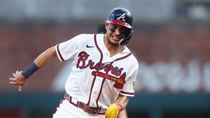 Aug 25, 2026; Atlanta, Georgia, USA; Atlanta Braves shortstop Mauricio Dubon (14) runs to third against the Los Angeles Dodgers in the first inning at Truist Park. Mandatory Credit: Brett Davis-Imagn Images