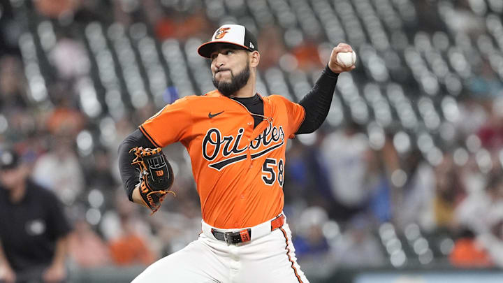 May 3, 2025; Baltimore, Maryland, USA; Baltimore Orioles pitcher Cionel Perez (58) delivers a pitch against the Kansas City Royals during the eighth inning at Oriole Park at Camden Yards.