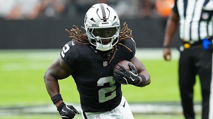 Aug 16, 2025; Paradise, Nevada, USA; Raiders running back Ashton Jeanty (2) rushes against the San Francisco 49ers during the first quarter at Allegiant Stadium. Mandatory Credit: Stephen R. Sylvanie-Imagn Images