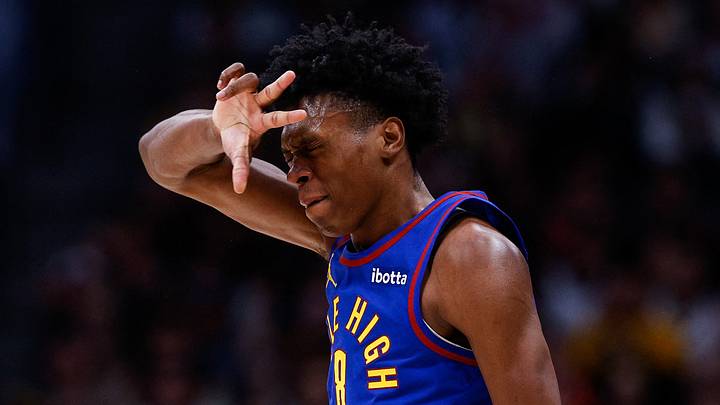 Denver Nuggets forward Peyton Watson (8) reacts after a basket in the third quarter against the Chicago Bulls at Ball Arena on March 24, 2025.