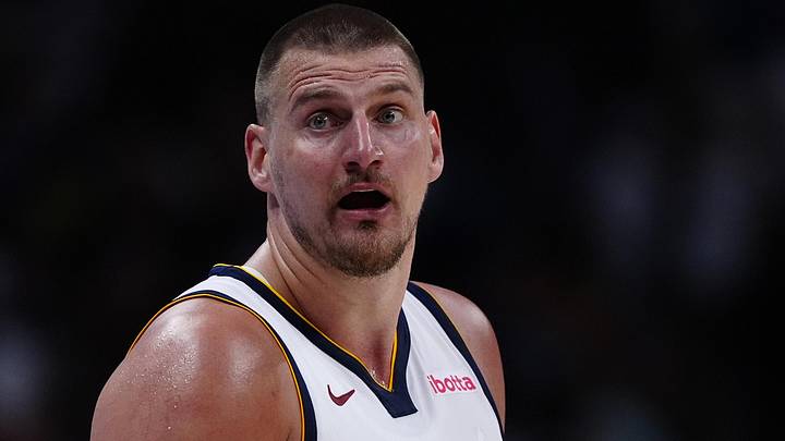 Apr 11, 2025; Denver, Colorado, USA; Denver Nuggets center Nikola Jokic (15) reacts in the fourth quarter against the Memphis Grizzlies at Ball Arena. Mandatory Credit: Ron Chenoy-Imagn Images