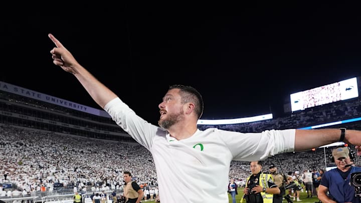 Sep 27, 2025; University Park, Pennsylvania, USA; Oregon Ducks head coach Dan Lanning reacts after defeating the Penn State Nittany Lions at Beaver Stadium. Mandatory Credit: James Lang-Imagn Images