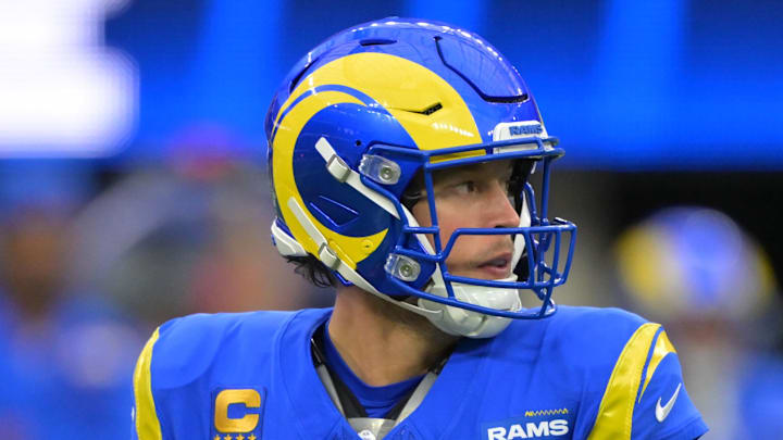 Jan 4, 2026; Inglewood, California, USA;  Los Angeles Rams quarterback Matthew Stafford (9) looks downfield against the Arizona Cardinals during the first half at SoFi Stadium. Mandatory Credit: Jayne Kamin-Oncea-Imagn Images