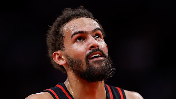 Trae Young looks up to the scoreboard