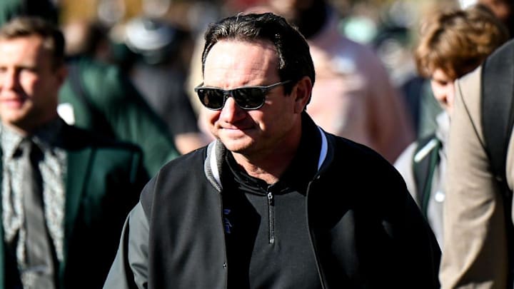 Michigan State's head coach Jonathan Smith, center, walks with the team to Spartan Stadium before the game against Indiana on Saturday, Nov. 2, 2024, in East Lansing. Michigan State's head coach Jonathan Smith, center, walks with the team to Spartan Stadium before the game against Indiana on Saturday, Nov. 2, 2024, in East Lansing.