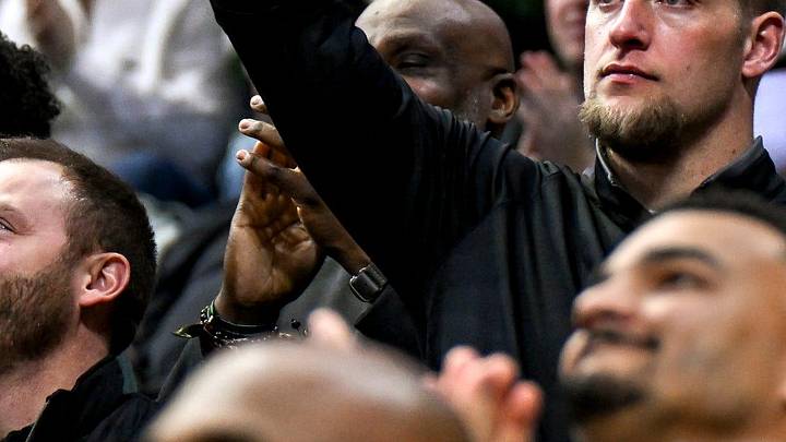 Max Bullough, Michigan State football's co-defensive coordinator and linebackers coach, celebrates after a MSU score against USC during the second half on Monday, Jan. 5, 2026, at the Breslin Center in East Lansing.