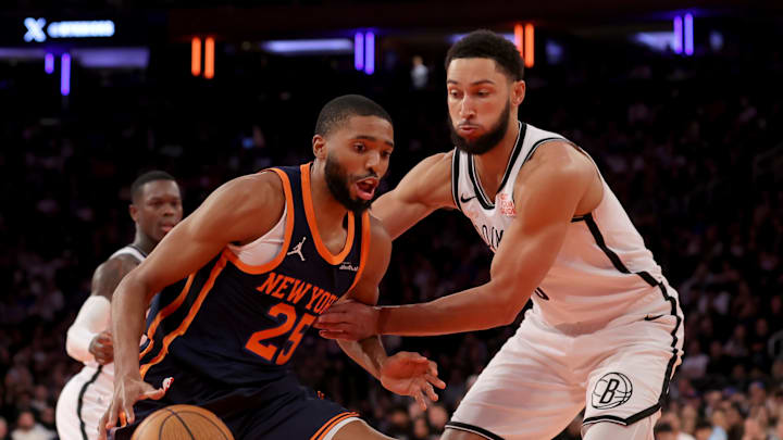 Nov 15, 2024; New York, New York, USA; New York Knicks forward Mikal Bridges (25) drives to the basket against Brooklyn Nets guard Ben Simmons (10) during the fourth quarter at Madison Square Garden. Mandatory Credit: Brad Penner-Imagn Images