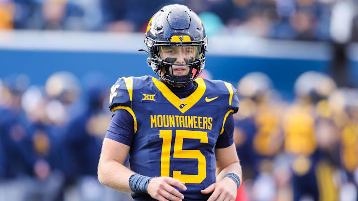 Nov 29, 2025; Morgantown, West Virginia, USA; West Virginia Mountaineers quarterback Scotty Fox Jr. (15) on the field during the second quarter against the Texas Tech Red Raiders at Milan Puskar Stadium. Mandatory Credit: Ben Queen-Imagn Images Nov 29, 2025; Morgantown, West Virginia, USA; West Virginia Mountaineers quarterback Scotty Fox Jr. (15) on the field during the second quarter against the Texas Tech Red Raiders at Milan Puskar Stadium. Mandatory Credit: Ben Queen-Imagn Images