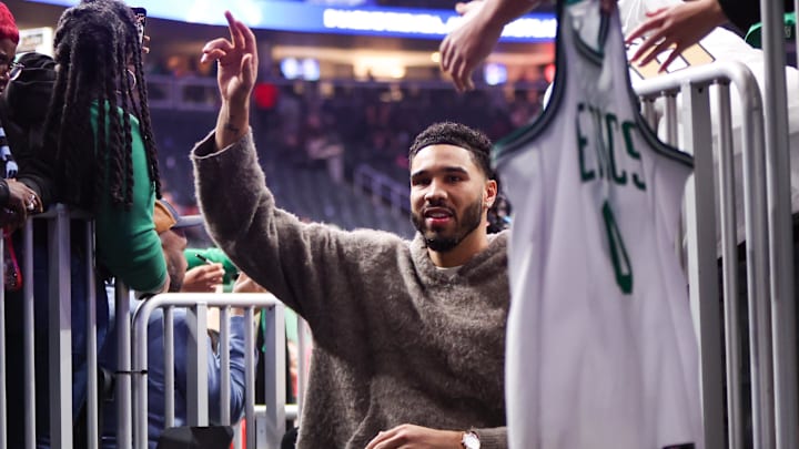 Jan 17, 2026; Atlanta, Georgia, USA; Boston Celtics forward Jayson Tatum (0) celebrates with fans after a victory over the Atlanta Hawks at State Farm Arena. Mandatory Credit: Brett Davis-Imagn Images