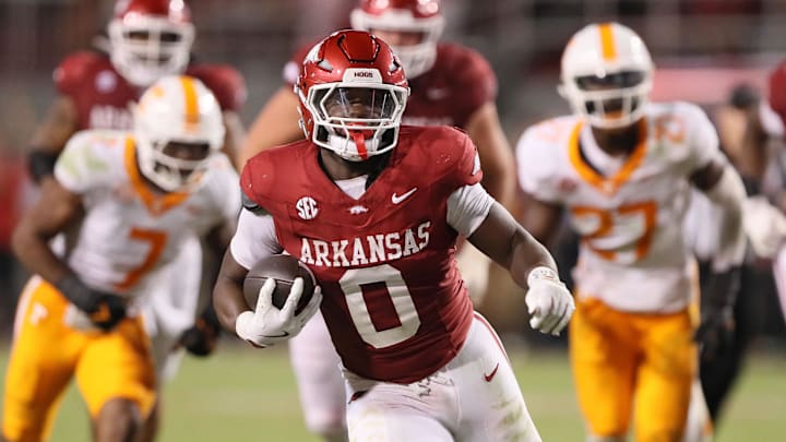 Oct 5, 2024; Fayetteville, Arkansas, USA; Arkansas Razorbacks running back Braylen Russell (0) rushes in the fourth quarter against the Tennessee Volunteers at Donald W. Reynolds Razorback Stadium. Arkansas won 19-14. Mandatory Credit: Nelson Chenault-Imagn Images