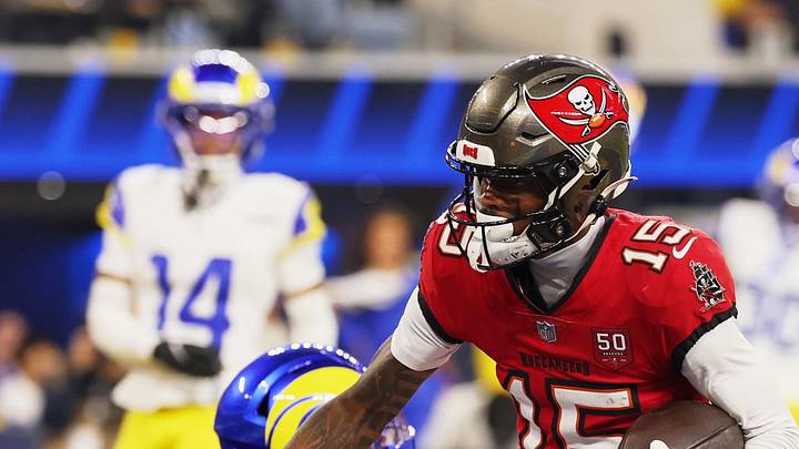 Tampa Bay Buccaneers wide receiver Tez Johnson (15) catches a fourteen-yard touchdown pass thrown by quarterback Baker Mayfie