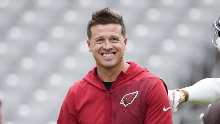 Arizona Cardinals head coach Mike LaFleur shares a laugh with receiver Kendrick Bourne (17) during training camp at State Farm Stadium in Glendale on July 26, 2026.