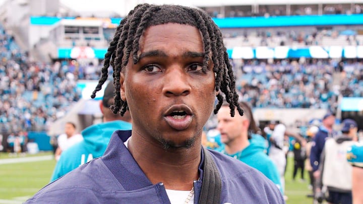 Tennessee Titans quarterback Cam Ward walks off the field after the game at EverBank Stadium. Tennessee Titans quarterback Cam Ward walks off the field after the game at EverBank Stadium.
