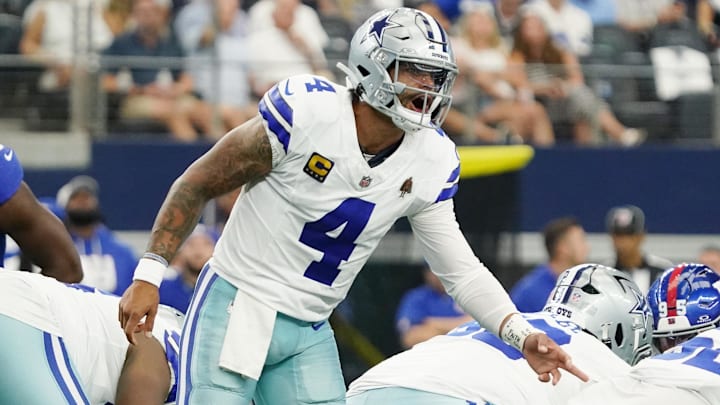 Dallas Cowboys quarterback Dak Prescott signals to teammates before a snap against the New York Giants 