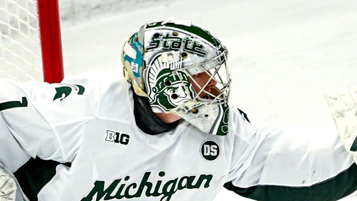 Michigan State's Trey Augustine catches a Minnesota shot during the first period on Friday, Jan. 23, 2026, at Munn Ice Arena in East Lansing. Michigan State's Trey Augustine catches a Minnesota shot during the first period on Friday, Jan. 23, 2026, at Munn Ice Arena in East Lansing.