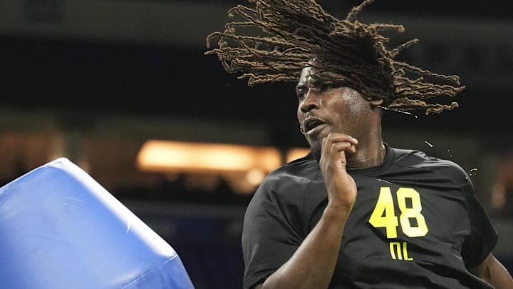 UCF defensive lineman Malachi Lawrence goes through drills at the Scouting Combine.