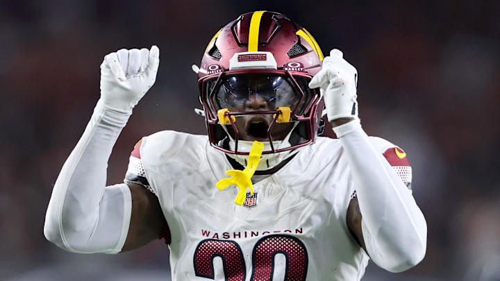 Sep 23, 2024; Cincinnati, Ohio, USA; Washington Commanders safety Jeremy Reaves (39) celebrates his tackle during the first quarter against the Cincinnati Bengals at Paycor Stadium. Mandatory Credit: Joseph Maiorana-Imagn Images
