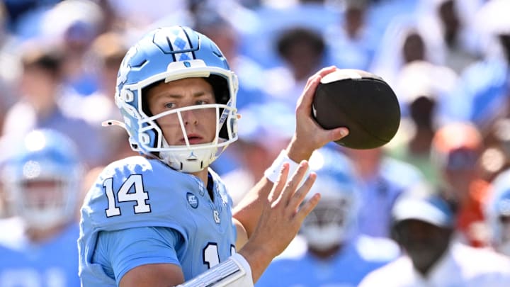 Oct 4, 2025; Chapel Hill, North Carolina, USA; North Carolina Tar Heels quarterback Max Johnson (14) looks to pass in the second quarter at Kenan Stadium. Mandatory Credit: Bob Donnan-Imagn Images