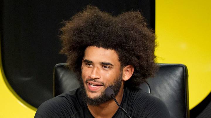Oregon quarterback Dante Moore speaks during a press conference on Aug. 18, 2026, at the Hatfield-Dowlin Complex in Eugene, Oregon. Oregon quarterback Dante Moore speaks during a press conference on Aug. 18, 2026, at the Hatfield-Dowlin Complex in Eugene, Oregon.