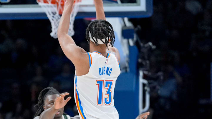 Oklahoma City forward Ousmane Dieng (13) shoots a 3-pointer in the fourth quarter during an NBA game between Oklahoma City and Milwaukee at the Paycom Center in Oklahoma City on Monday, Feb. 3, 2025. Oklahoma City forward Ousmane Dieng (13) shoots a 3-pointer in the fourth quarter during an NBA game between Oklahoma City and Milwaukee at the Paycom Center in Oklahoma City on Monday, Feb. 3, 2025.
