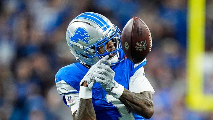 Detroit Lions wide receiver Jameson Williams (1) misses a catch against New Orleans Saints safety Julian Blackmon (23) and safety Justin Reid (21) during the first half at Ford Field in Detroit on Sunday, Sept. 13, 2026.