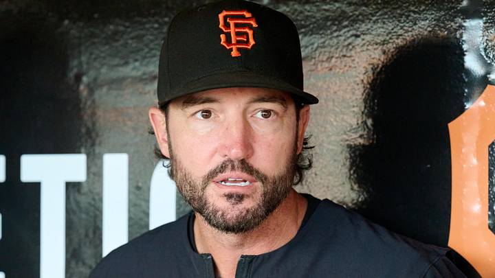 San Francisco, California, USA; San Francisco Giants manager Tony Vitello (23) speaks to the media in the dugout before a game against the Colorado Rockies at Oracle Park. Mandatory Credit: Robert Edwards-Imagn Images