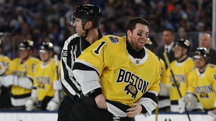 Feb 1, 2026; Tampa Bay, Florida, USA; Boston Bruins goaltender Jeremy Swayman (1) skates back up ice after fight with Tampa Bay Lightning goaltender Andrei Vasilevskiy during the second period in the 2026 Stadium Series ice hockey game at Raymond James Stadium. Mandatory Credit: Kim Klement Neitzel-Imagn Images Feb 1, 2026; Tampa Bay, Florida, USA; Boston Bruins goaltender Jeremy Swayman (1) skates back up ice after fight with Tampa Bay Lightning goaltender Andrei Vasilevskiy during the second period in the 2026 Stadium Series ice hockey game at Raymond James Stadium. Mandatory Credit: Kim Klement Neitzel-Imagn Images