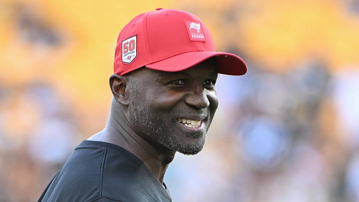 Aug 16, 2025; Pittsburgh, Pennsylvania, USA; TTampa Bay Buccaneers head coach Todd Bowles () warms up for a game against the Pittsburgh Steelers at Acrisure Stadium. Mandatory Credit: Barry Reeger-Imagn Images