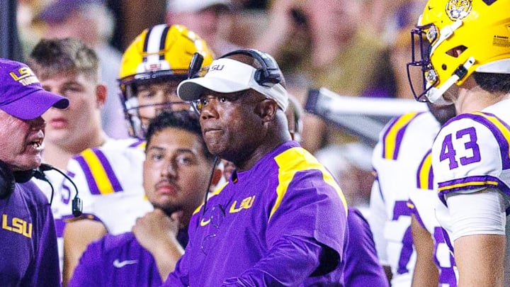 Sep 6, 2025; Baton Rouge, Louisiana, USA;  LSU Tigers head coach Brian Kelly reacts against associate head coach Frank Wilson during the second half against Louisiana Tech Bulldogs at Tiger Stadium. Mandatory Credit: Stephen Lew-Imagn Images