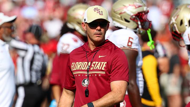 Sep 19, 2026; Tuscaloosa, Alabama, USA; Florida State Seminoles head coach Mike Norvell warms up his team before a game against the Alabama Crimson Tide at Saban Field at Bryant-Denny Stadium. Mandatory Credit: David Leong-Imagn Images