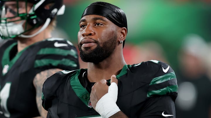 Oct 31, 2024; East Rutherford, New Jersey, USA; New York Jets defensive end Haason Reddick (7) on the sidelines during the first quarter against the Houston Texans at MetLife Stadium. Mandatory Credit: Brad Penner-Imagn Images