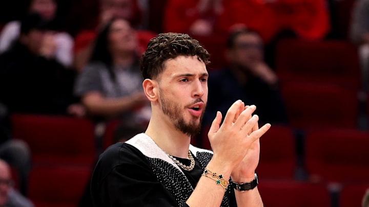 Feb 1, 2025; Houston, Texas, USA; Houston Rockets center Alperen Sengun (28) reacts to a play while on the bench against the Brooklyn Nets during the fourth quarter at Toyota Center. Mandatory Credit: Erik Williams-Imagn Images