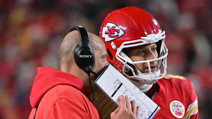 Dec 7, 2025; Kansas City, Missouri, USA; Kansas City Chiefs quarterback Patrick Mahomes (15) talks to Kansas City Chiefs offensive coordinator Matt Nagy during the second quarter against the Houston Texans at GEHA Field at Arrowhead Stadium. Mandatory Credit: Amy Kontras-Imagn Images