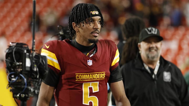 Dec 29, 2024; Landover, Maryland, USA; Washington Commanders quarterback Jayden Daniels (5) looks on while leaving the field after defeating the Atlanta Falcons at Northwest Stadium. Mandatory Credit: Amber Searls-Imagn Images Dec 29, 2024; Landover, Maryland, USA; Washington Commanders quarterback Jayden Daniels (5) looks on while leaving the field after defeating the Atlanta Falcons at Northwest Stadium. Mandatory Credit: Amber Searls-Imagn Images